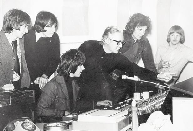 A schoolmasterly approach: Richards, centre, wearing glasses, with the Hollies in the studio in the early 1970s